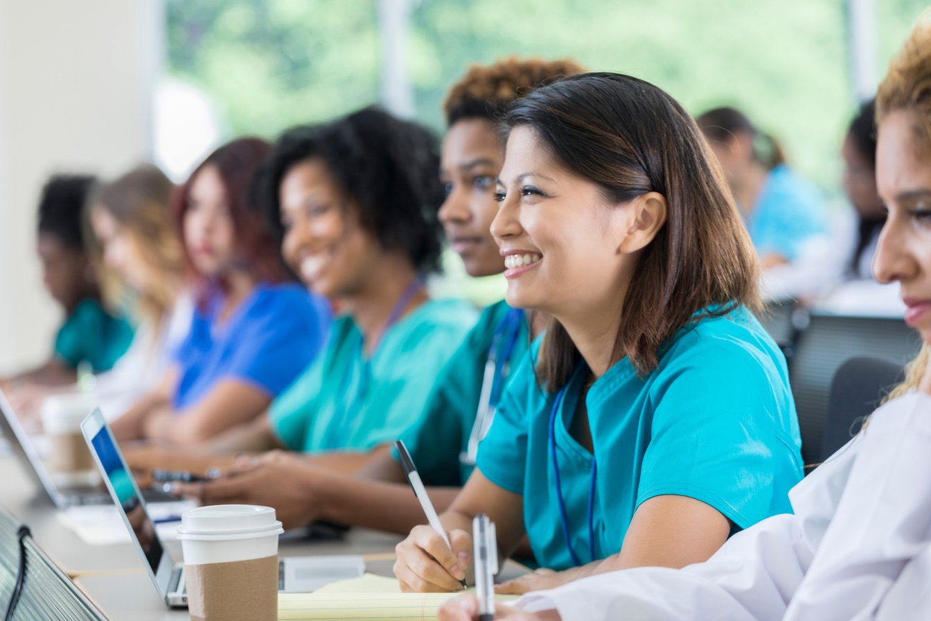 Attentive healthcare professionals attending medical conference